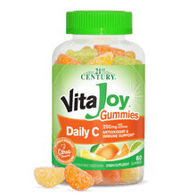 A bottle of 21st Century VitaJoy Daily C 250 mg gummies with two vitajoy vitamin c gummies in front.