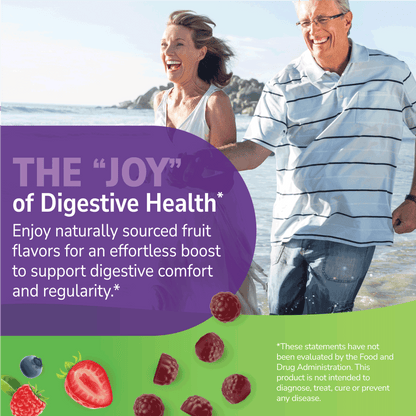 Man and woman walking on a beach with promotional text about digestive health and naturally sourced fruit flavors.