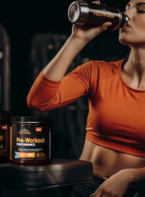 Woman drinking from a shaker bottle with a Pre-Workout supplement container in front