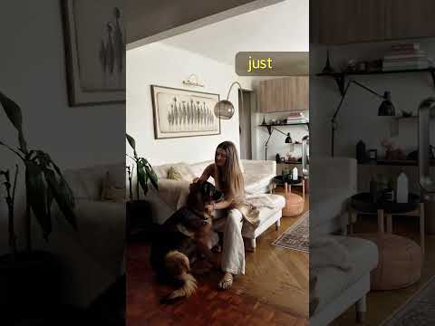 Video of a woman and her dog taking an 11-1 Multi Vitamins.