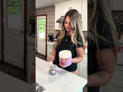 Woman getting ready in the morning having her 21st Century Vitamins Collagen Peptides