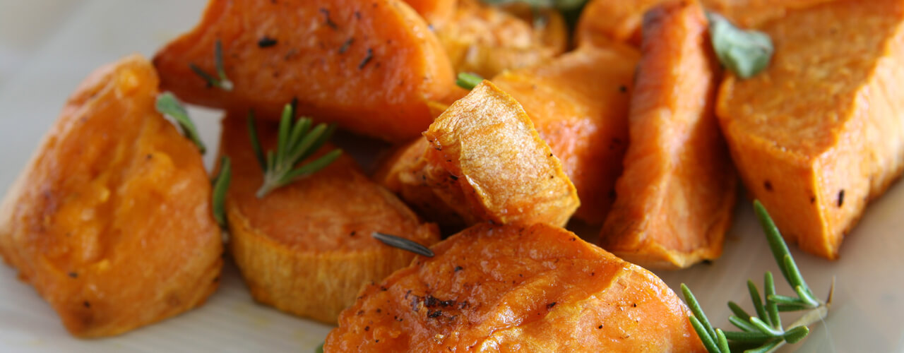 Delicious cubed sweet potatoes on a plate.