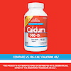 A bottle of 21st Century Calcium 500 plus D3 tablets with the words compare vs os-cal calcium plus D3.