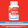 A bottle of 21st Century Calcium 500 plus D3 tablets with the words compare vs os-cal calcium plus D3.