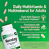 A bottle of 21st century sentry adults multivitamin and multimineral tablets with tablets coming out of the top, the words daily multivitamin & multimineral and claims daily multi support for overall wellness, formulated with essential nutrients for adult health and essential vitamins and minerals.