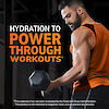 A strong man in a tank top holding a dumbbell looking down at his flexed bicep and the words hydration to power through workouts.