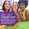 An image of three female friends smiling and the claim the joy of digestive health, enjoy naturally sourced fruit flavors for an effortless boost to your daily fiber intake for daily digestive support.